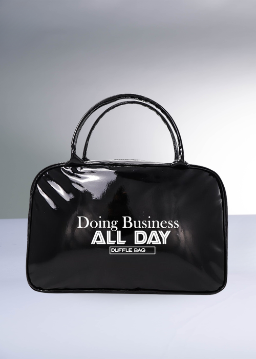 Glossy patent leather business bag with oversized silhouette and secure top-zip closure for all-day business and travel use