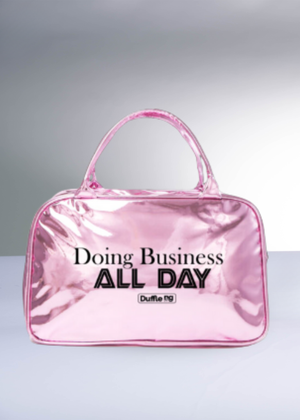 Glossy patent leather business bag with oversized silhouette and secure top-zip closure designed for all-day business and travel use