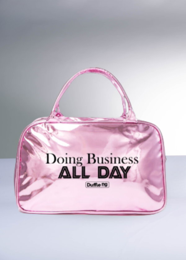 Glossy patent leather business bag with oversized silhouette and secure top-zip closure designed for all-day business and travel use