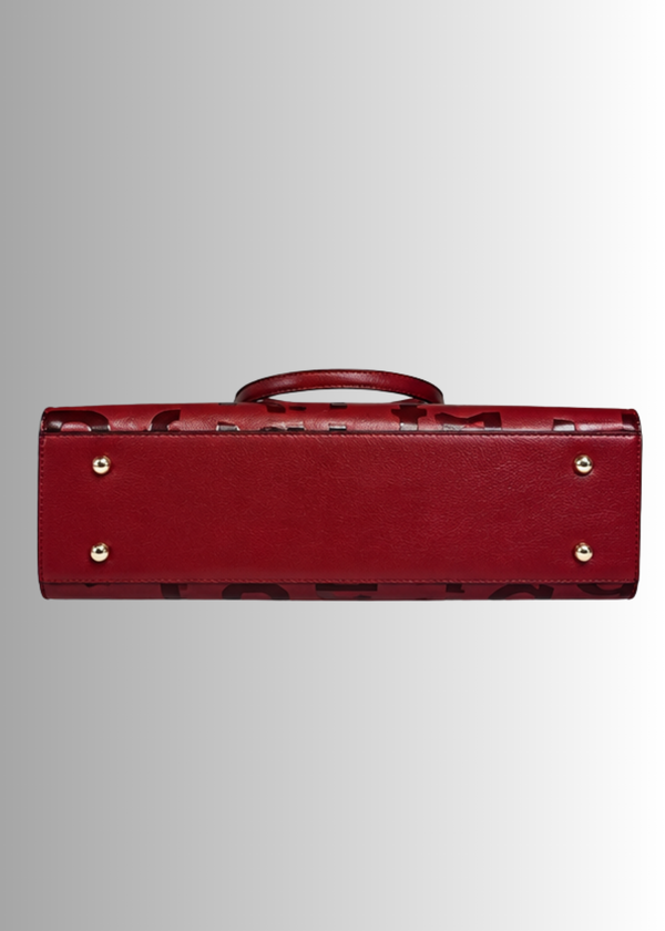 Sienna Luxe Tote vegan leather and gold accents, showcasing structured silhouette and double handles. #burgundy