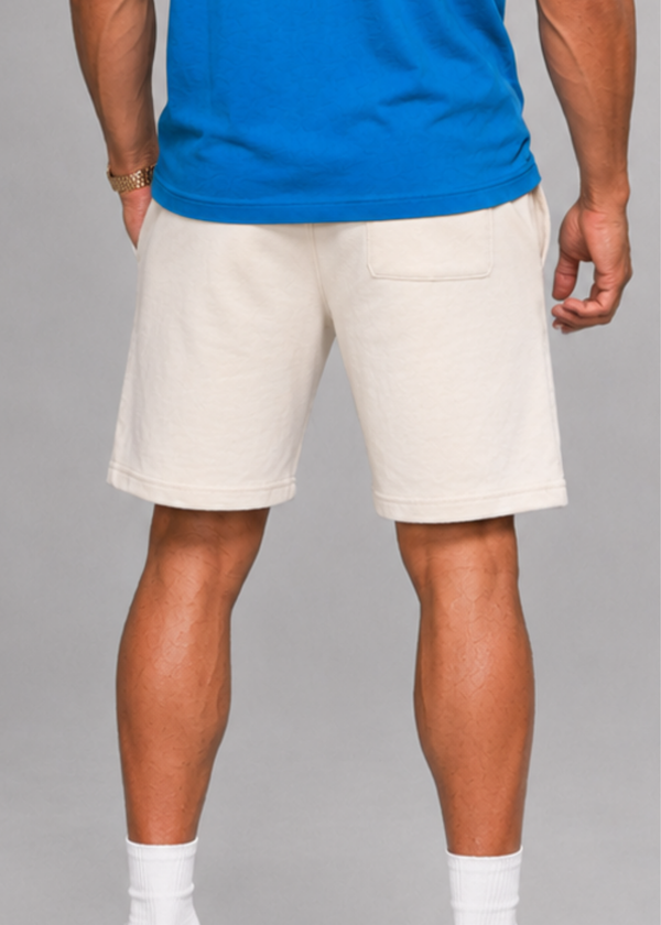 DUFFLE BAG Premium Cream Jogger Shorts in soft heavyweight fabric with elastic waistband and tonal logo, designed for comfort and style