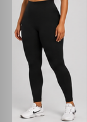 Person wearing #black leggings with white sneakers on a light gray background