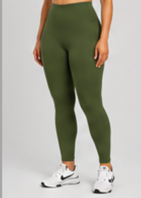 Person wearing #Armygreen leggings with white sneakers on a gray background