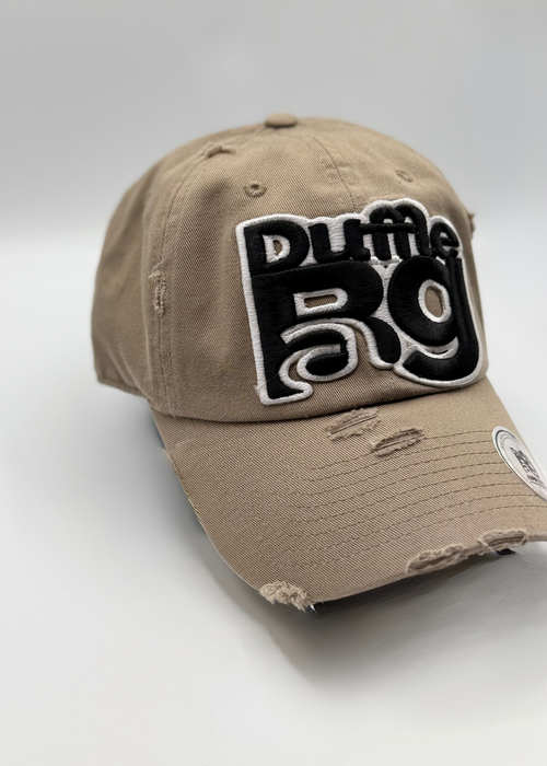 Distress trucker hat with bold embroidered logo and distressed design.