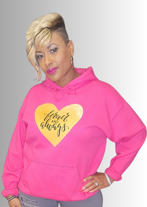 Love Gold Heart hoodie with a yellow heart and text, worn by a model.