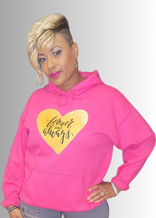 Love Gold Heart hoodie with a yellow heart and text, worn by a model.