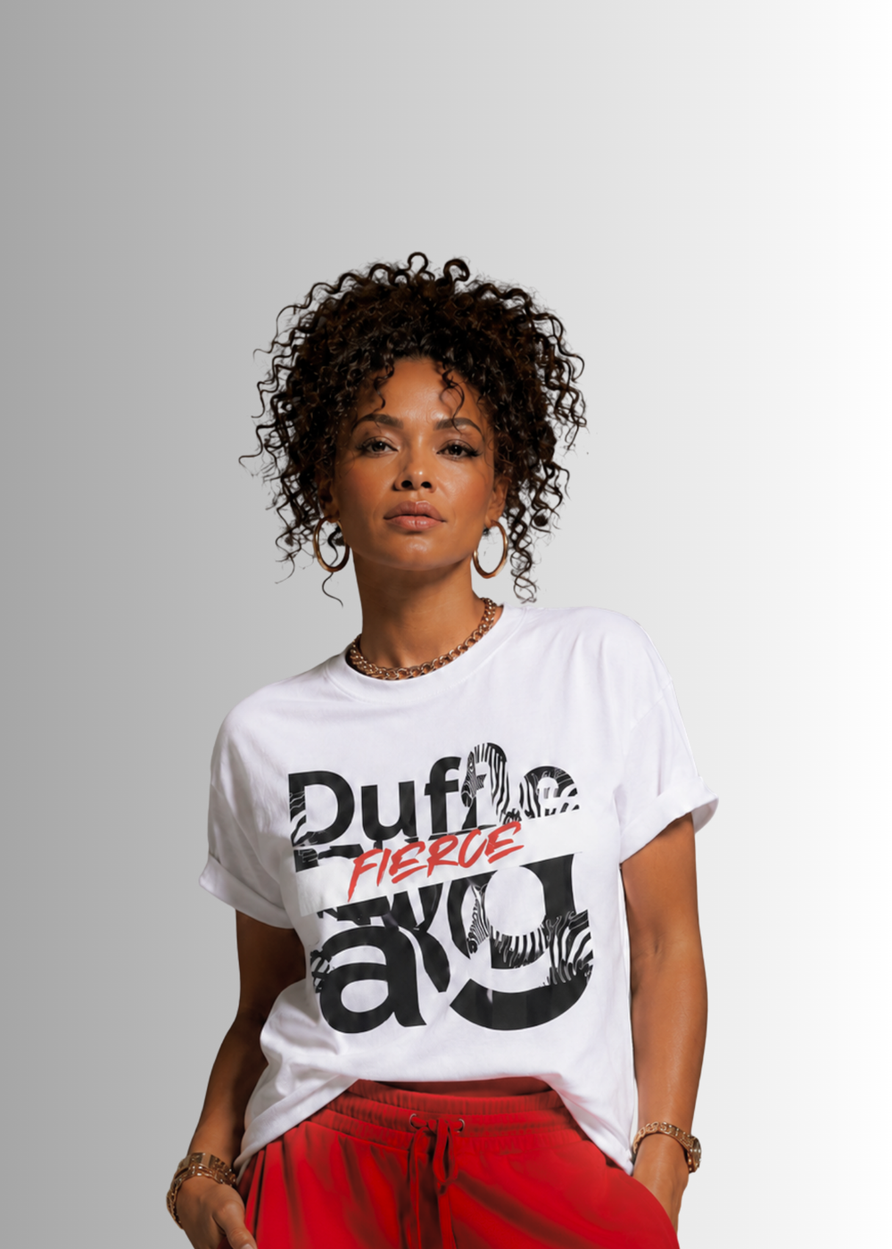 Woman wearing Zebra Empowerment Tee with red lettering and zebra print design