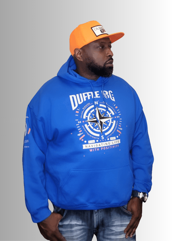 N.A.V Empowerment Hoodie by Duffle Bag in blue with compass design, worn by a model.
#blue